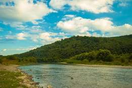 river next to hillside